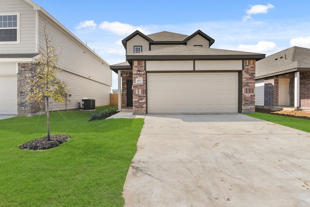 view of front of home with central air condition unit and a front lawn