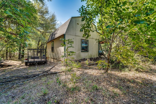 view of home's exterior with a deck