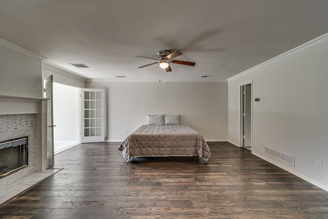 406 Muskingum Rd, Waxahachie, TX 75165 - bedroom with wood finished floors, a fireplace with flush hearth, ornamental molding, baseboards, and ceiling fan