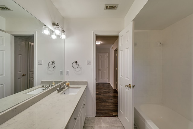 bathroom featuring vanity and tile patterned flooring