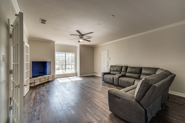 living room with crown molding, ceiling fan, a textured ceiling, and dark hardwood / wood-style flooring