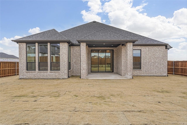 rear view of house with a patio area