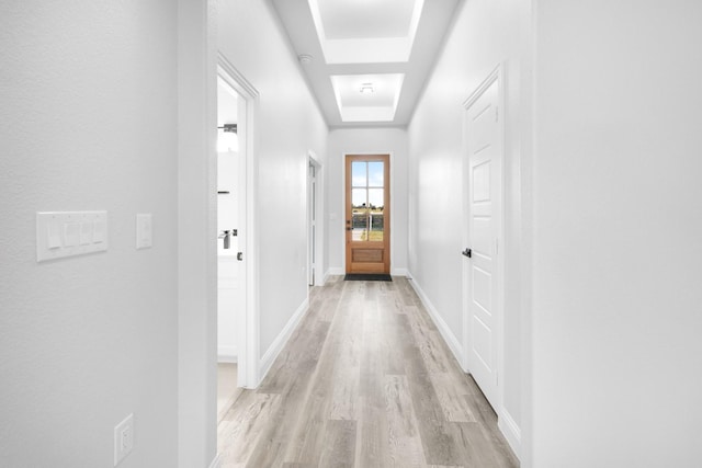 hallway featuring light hardwood / wood-style flooring