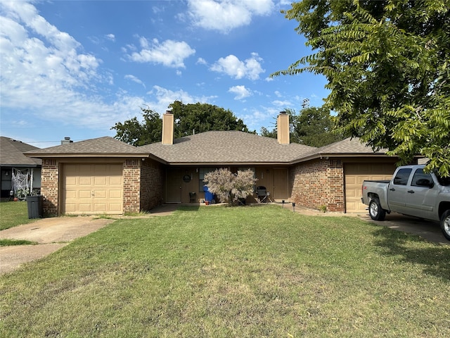 ranch-style home with a front lawn and a garage