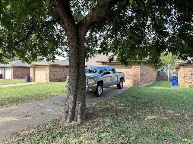 view of yard with a garage