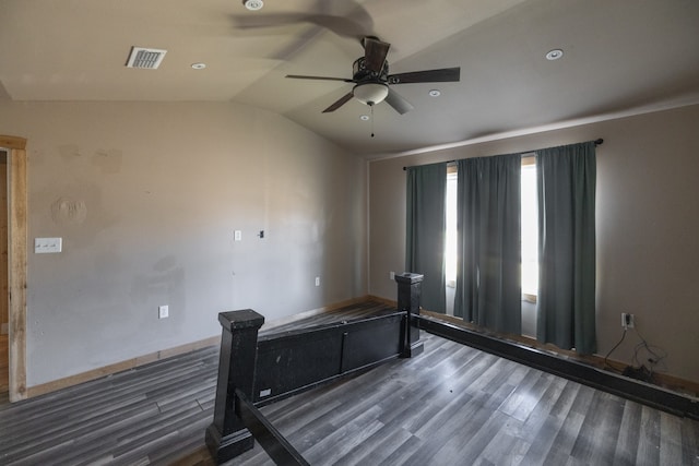 unfurnished bedroom with dark hardwood / wood-style floors, ceiling fan, and vaulted ceiling