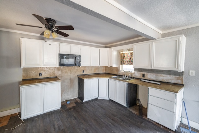 kitchen featuring sink, dark hardwood / wood-style flooring, white cabinetry, ceiling fan, and crown molding