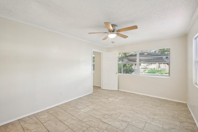 unfurnished room featuring ceiling fan, a textured ceiling, and ornamental molding