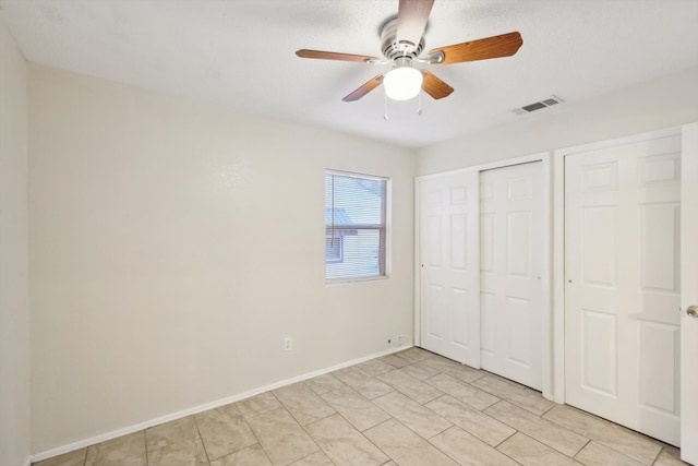 unfurnished bedroom with ceiling fan