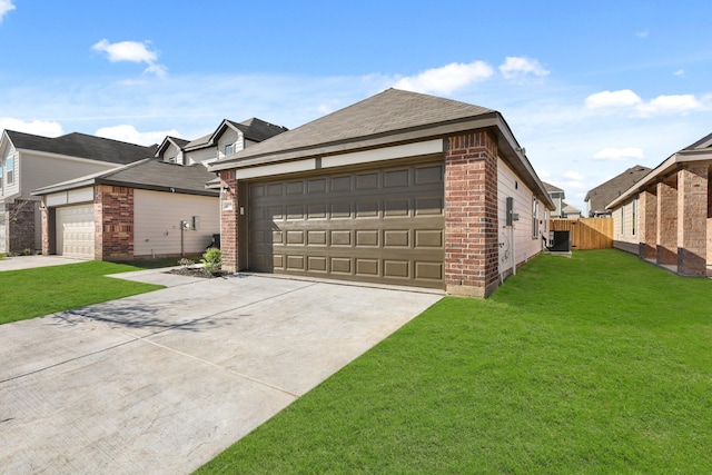 view of side of property featuring an outbuilding, central air condition unit, and a lawn