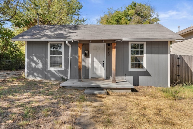 820 Allen St, Denton, TX 76205 - view of front of house featuring fence and a shingled roof