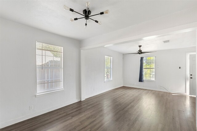 820 Allen St, Denton, TX 76205 - unfurnished room featuring dark wood-style flooring, baseboards, and visible vents