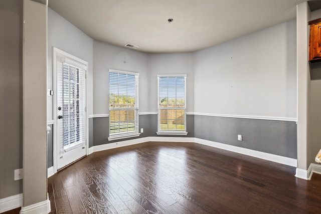 carpeted empty room with crown molding