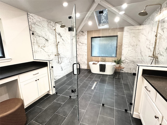 10544 Cox Ln, Dallas, TX 75229 - bathroom featuring a marble finish shower, a freestanding tub, a skylight, and vanity