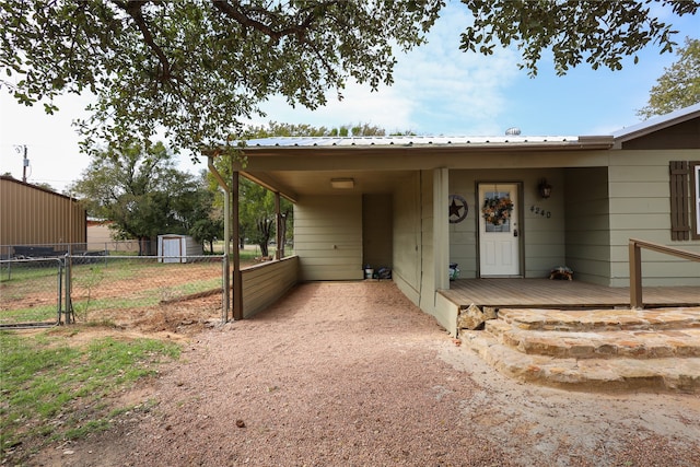 view of front of home with a storage unit