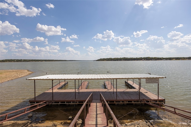 dock area featuring a water view