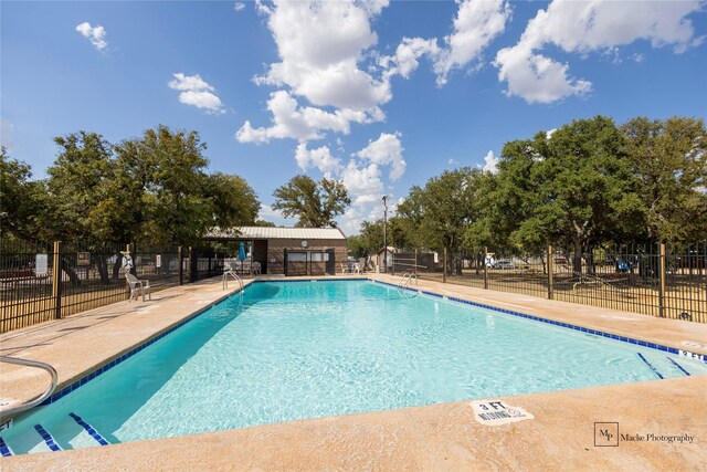 4240 Cheyenne Dr, May, TX 76857 - pool with fence and a patio area