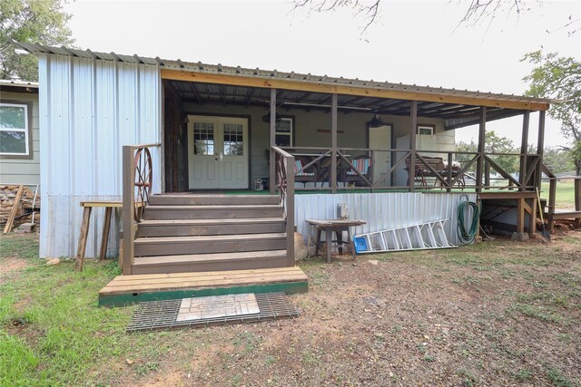 4240 Cheyenne Dr, May, TX 76857 - rear view of house featuring metal roof