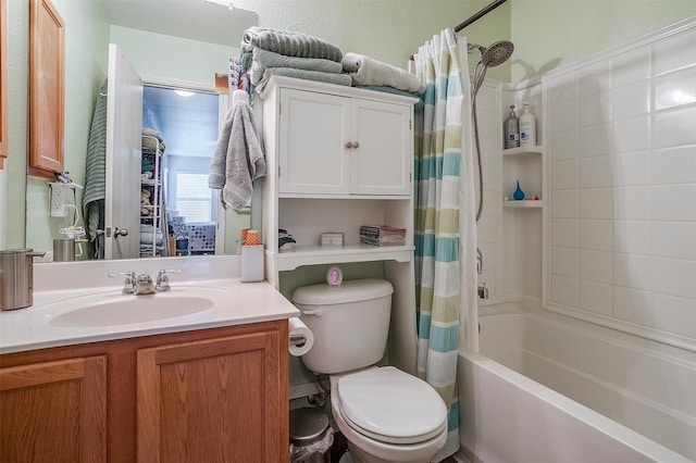 full bathroom featuring vanity, toilet, and shower / tub combo