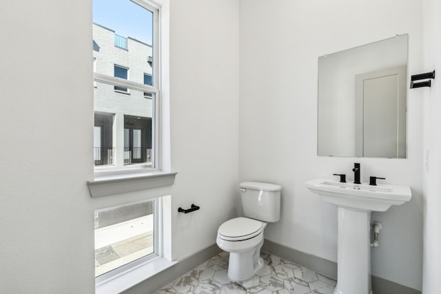 bathroom with toilet and sink