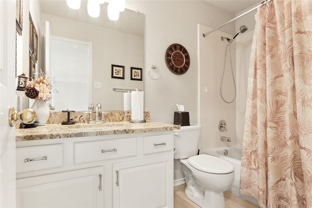 full bathroom featuring toilet, shower / tub combo, wood-type flooring, and vanity