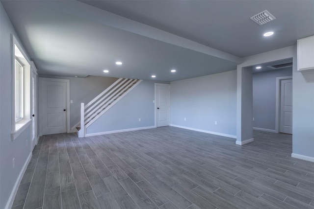 basement with dark wood-type flooring