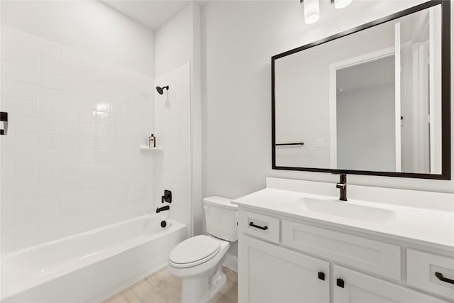 full bathroom featuring vanity, tub / shower combination, wood finished floors, and toilet