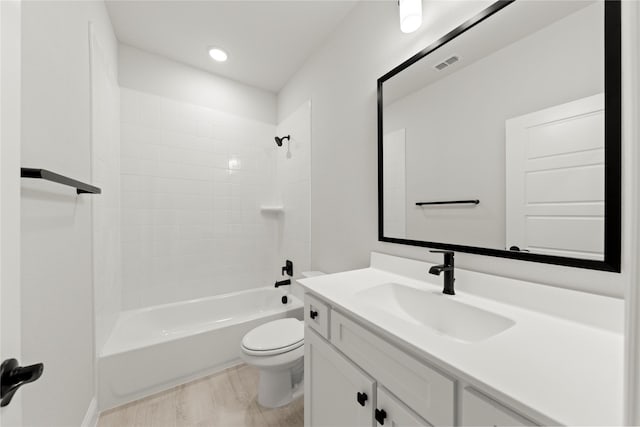 full bathroom featuring toilet, shower / bathing tub combination, vanity, and visible vents