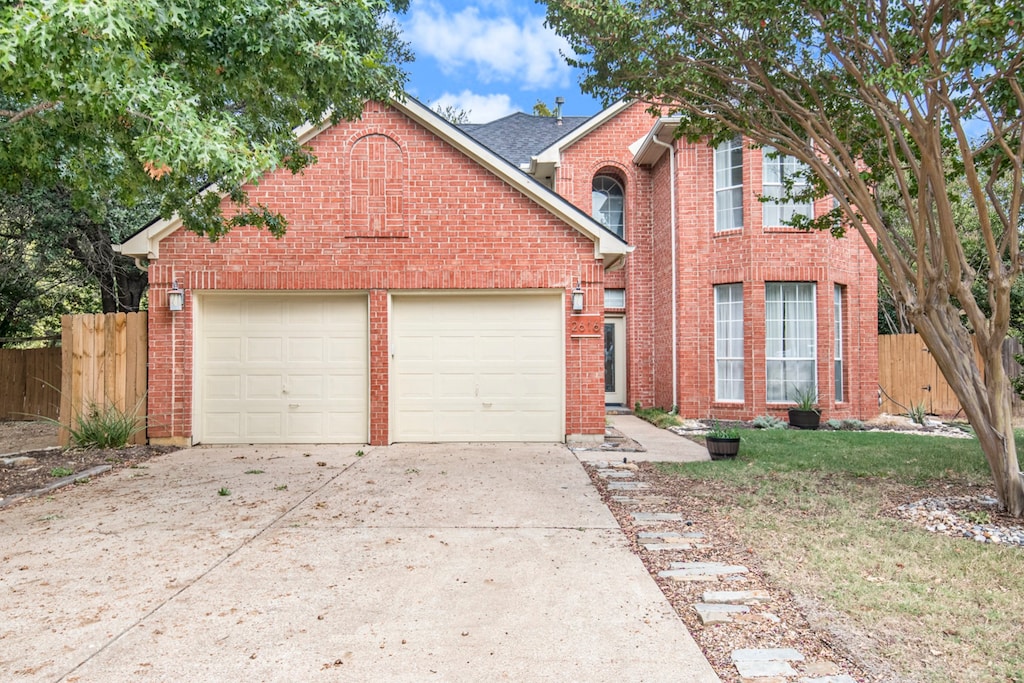 front of property featuring a garage