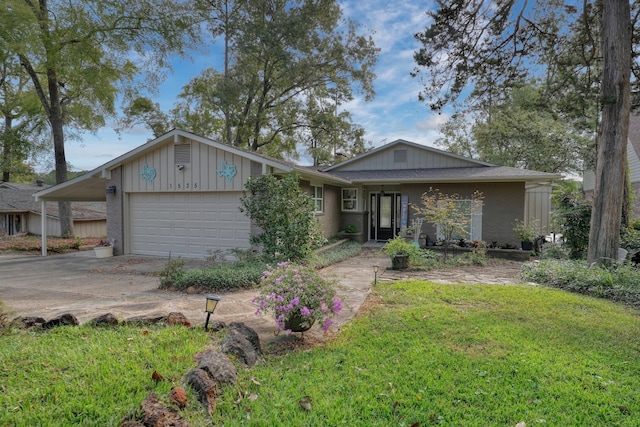 single story home with a garage and a front lawn