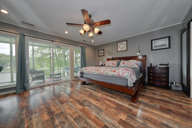 bedroom with a textured ceiling, dark hardwood / wood-style flooring, access to exterior, ceiling fan, and ornamental molding