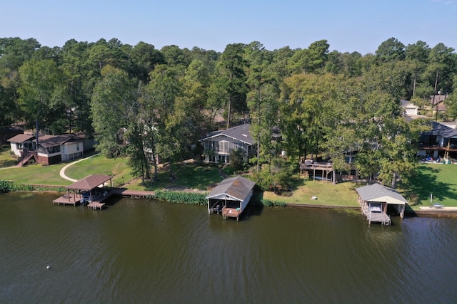 birds eye view of property featuring a water view