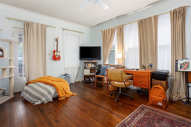 home office featuring ornamental molding, hardwood / wood-style flooring, and ceiling fan