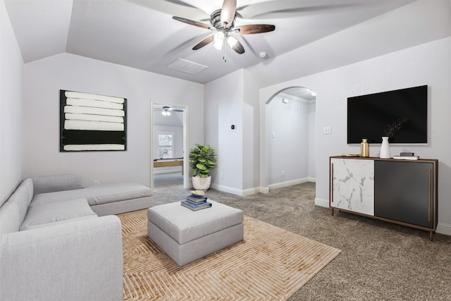 living room featuring lofted ceiling, carpet, and ceiling fan