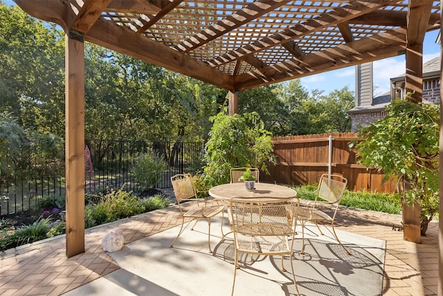 view of patio featuring a pergola