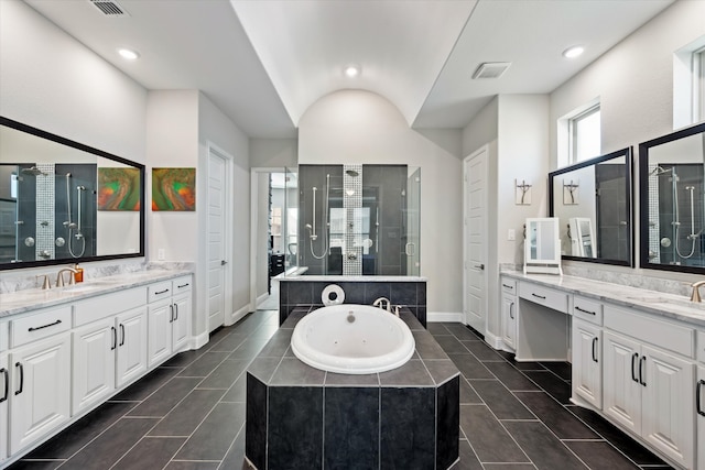 bathroom featuring vanity, separate shower and tub, and tile patterned flooring