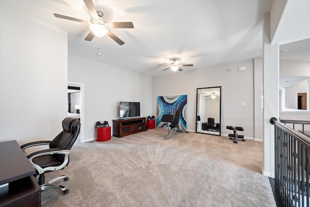 office featuring light carpet and ceiling fan