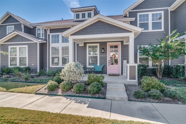 craftsman inspired home featuring a porch