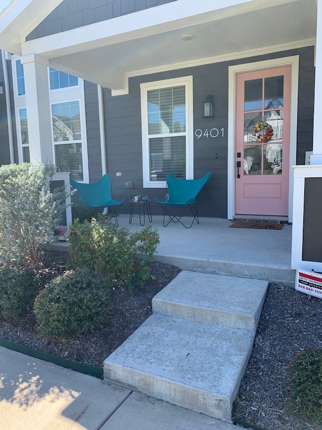 property entrance with a porch