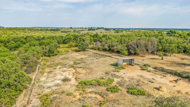 birds eye view of property featuring a rural view