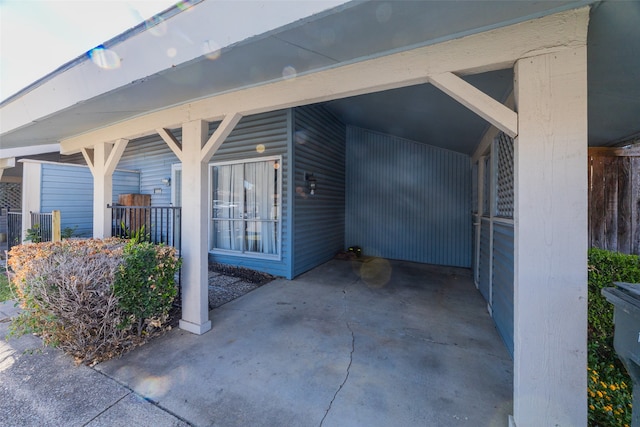 exterior space featuring a carport