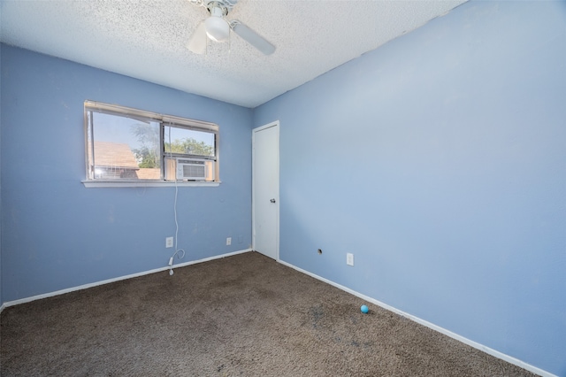 unfurnished room featuring ceiling fan, carpet flooring, a textured ceiling, and cooling unit