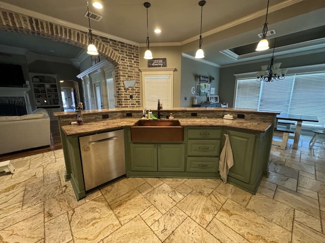 kitchen with dishwasher, sink, decorative light fixtures, and a kitchen island with sink