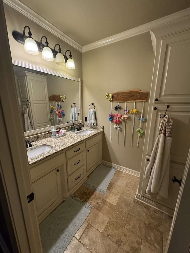 bathroom featuring vanity and crown molding