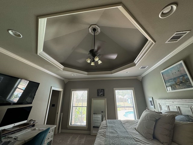 bedroom with ceiling fan, crown molding, multiple windows, and carpet floors