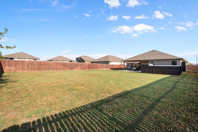 view of yard with a swimming pool