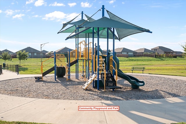 view of playground featuring a yard