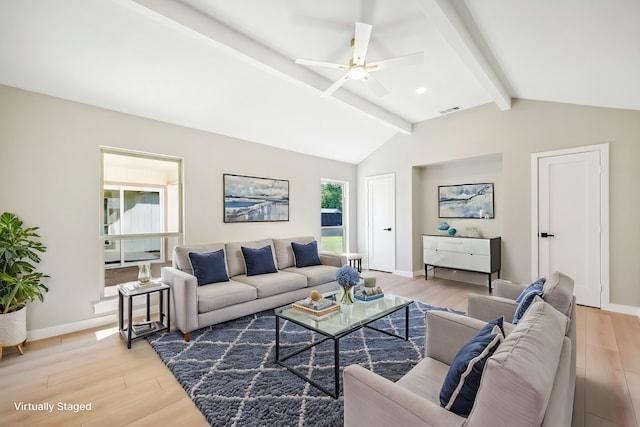 living room featuring vaulted ceiling with beams, hardwood / wood-style floors, and ceiling fan