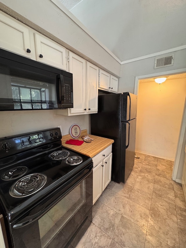 kitchen featuring white cabinetry and black appliances