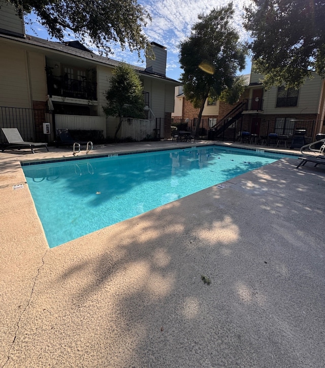 view of pool with a patio area